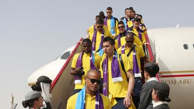 Manchester City captain Vincent Kompany leads the squad off their Etihad Airways flight after landing in Abu Dhabi. Photo Courtesy EAA