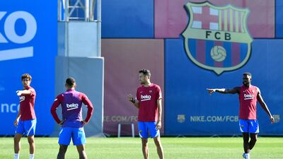 Barcelona's Sergi Roberto, Memphis Depay, Sergio Busquets and Samuel Umtiti. AFP