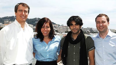 From left, Edward Borgerding, the chief executive of Imagenation Abu Dhabi, Daniela Tully of Imagenation, Nawaf al Janahi, the Sea Shadow director, and Stefan Brunner, also of Imagenation, at the Cannes Film Festival yesterday.