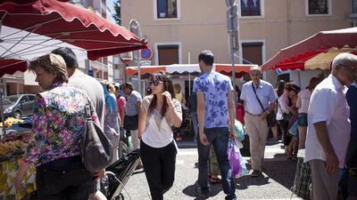 12:32 - Ms Mekhalfia shops at the Charpennes market in Lyon for iftar ingredients.