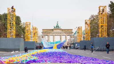 The "Visions in Motion“ installation is made up of ribbons and messages written by the German people.David von Becker