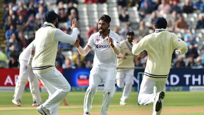 India's Mohammad Siraj celebrates the dismissal of England's Joe Root. AP