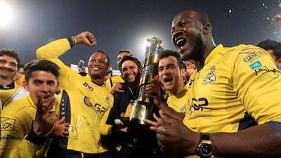 Darren Sammy, right, captained Peshawar Zalmi to the 2017 PSL title, winning the final in Lahore. Faisal Mahmood / Reuters