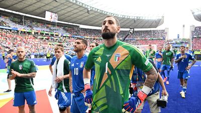 Dejected Italy goalkeeper Gianluigi Donnarumma after defeat to Switzerland in Berlin. EPA
