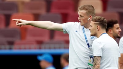 England's Jordan Pickford and Kieran Trippier on the pitch before the match. Reuters