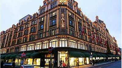 The Harrods department store in central London is illuminated during Christmas last year.
