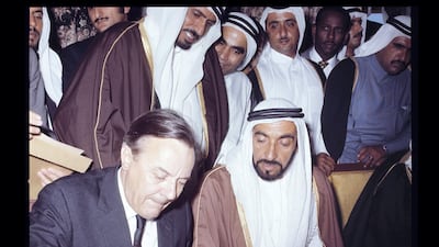 British colonial administrator Sir Geoffrey Archer, pictured with Sheikh Zayed, signs the Treaty of Friendship with the UAE, recognising the Emirates as 'a sovereign and independent state'. National Portrait Gallery via Dubai Media Office