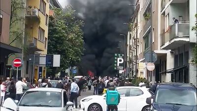Several vehicles caught fire in Milan after the explosion. Photo: Twitter