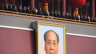 China's President Xi Jinping watches the parade with Communist Party leaders.