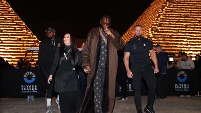 Deontay Wilder arrives with his fiancée, Telli Swift, ahead of the Day of Reckoning. Getty Images