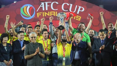 Al Ahed players celebrate their AFC Cup Final triumph. EPA