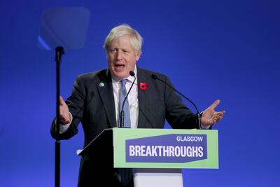 British Prime Minister Boris Johnson delivers a speech during a session at Cop26. EPA
