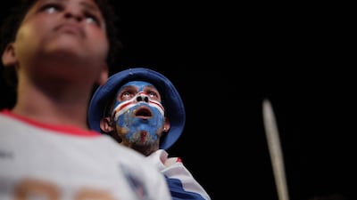 Cape Verde fans react as they gather in Praia to watch their team play in a World Cup match against Uruguay. AFP
