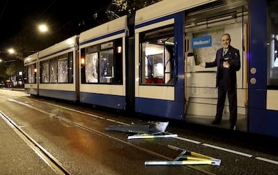 A tram at the '40-'45 Square in the west of Amsterdam was damaged in unrest following violence last week. AP