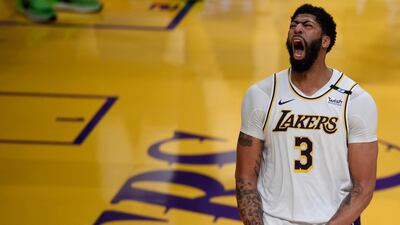Los Angeles Lakers forward Anthony Davis reacts after a dunk during the second half against the Phoenix Suns at Staples Center. Reuters