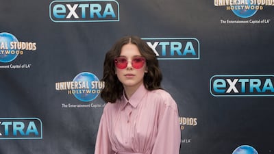 Millie Bobby Brown, in pink Sies Marjan, arrives at the 'Extra' studios in Hollywood on October 27, 2017. Getty Images