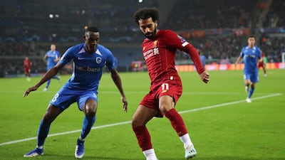 Mohamed Salah, right, vies for the ball with Genk's Jhon Lucumi. AP Photo