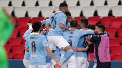 Manchester City's Kevin De Bruyne (2l) celebrates with teammates after scoring his sides first goal in their 2-1 win against Paris Saint Germain in the Champions League semi-final first leg. AP