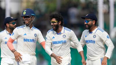 India's Ravindra Jadeja, center, captain Rohit Sharma, right and Yashasvi Jaiswal celebrate the wicket of Bangladesh's Litton Das. AP