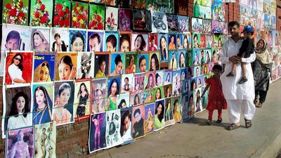 Indian film posters on display in Pakistan. EPA