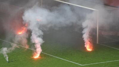 HSV supporters light flares during the German Bundesliga soccer match between Hamburger SV and Borussia Moenchengladbach in Hamburg, Germany, , on May 12, 2018. David Hecker / EPA