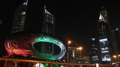 The Museum of the Future decorated for the UAE’s 50th National Day celebration on Sheikh Zayed Road in Dubai. Pawan Singh/The National.