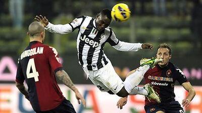 Kwadwo Asamoah, centre, and his Juventus teammates had to travel even farther than usual to play Cagliari because the league determined the host stadium was not safe.