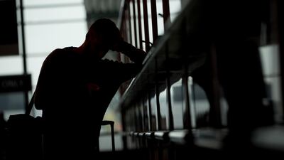 A Spanish passenger whose flight was cancelled, complains at the Ryanair ticket desks at the Charleroi airport, in Brussels. AP Photo
