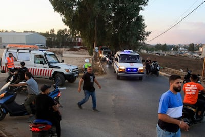 Emergency services arrive after Israeli strikes on the southern Lebanese village of Kfar Tibnit. AFP