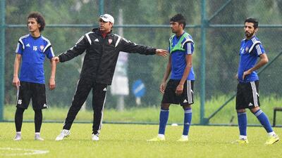 UAE coach Mahdi Ali, second left, leads a national team training session in Malaysia. The Emiratis open 2018 World Cup qualifying on Tuesday against East Timor in Kuala Lumpur. Courtesy UAE FA