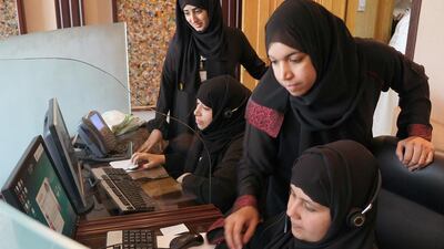 Shamma, Fatima and Shaikha receive their Sharia training from Dr Al Waseef at the fatwa centre in Abu Dhabi. Delores Johnson / The National