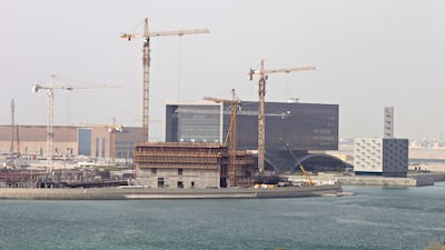 The Bahraini investment firm Arcapita hit the headlines in March last year when it filed for Chapter 11. Above, Arcapita's headquarters under construction at Bahrain Bay in 2012. Razan Alzayani / The National