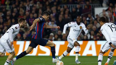 Barcelona Robert Lewandowski takes on the United defence. EPA