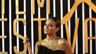 Egyptian actress Bushra Rozza poses on the red carpet during the premier of the film '1982' at the the El Gouna Film Festival in 2019. This year, the festival announced it will be taking place in October. AFP