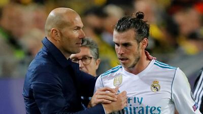 Real Madrid manager Zinedine Zidane, left, has an injury concern over Welsh forward Gareth Bale. Wolfgang Rattay / Reuters