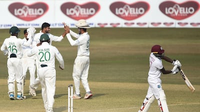 Bangladesh celebrate the dismissal of West Indies' Jermaine Blackwood by Mehedi Hasan for nine. AFP