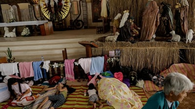 Residents affected by the Taal Volcano eruption rest in Padre Pio Shrine, Santo Tomas, Batangas, Philippines. Reuters