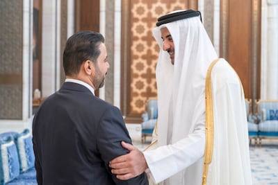 Iraq's Prime Minister Ali Al Zaidi, left, meets Sheikh Tamim, Emir of Qatar, at Lusail Palace on the outskirts of Doha. AFP