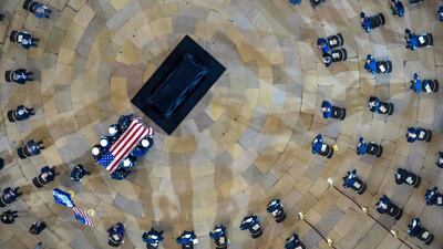 Capitol Police officer William "Billy" Evans arrives to lie in honor in the Rotunda of the US Capitol in Washington. Mr Evans was killed and another wounded after a man drove through security and crashed into a barrier at the complex, forcing it into lockdown. AFP