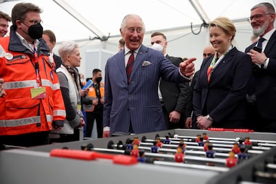 King Charles had a game of table football on a visit to a Ukrainian reception centre. Getty