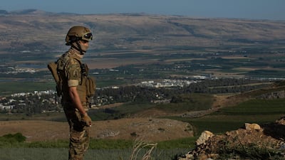 A Lebanese soldier stands guard preventing demonstrators from going closer to the Lebanon-Israel border during a demonstration to show solidarity with Palestinians on May 16, 2021 in Adaisseh, Lebanon.Getty