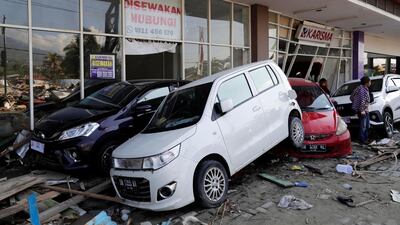 Cars washed up by the sea in Talise beach, Palu, Central Sulawesi, Indonesia. EPA