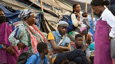 Hundreds of people from various African countries are gathered on the streets as they are evicted from the makeshift camp they are occupying around the Central Methodist Mission in Cape Town in South Africa. AFP