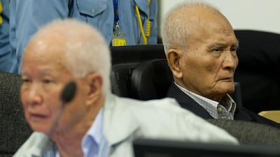 Former Khmer Rouge leaders Nuon Chea, right, and Khieu Samphan. Extraordinary Chambers in the Courts of Cambodia via AP