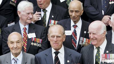 The Duke of Edinburgh istands amongst World War II veterans as they gather to commemorate the 60th anniversary of VJ Day at the Imperial War Museum in 2005. Chris Jackson/Getty Images