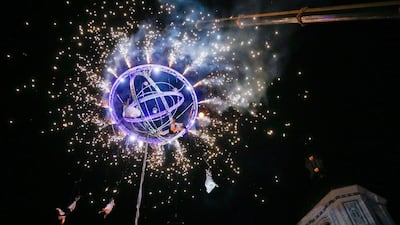 Circus artists perform as they hang on a special construction near the St Sophia Cathedral during the French Spring festival in Kiev, Ukraine. Sergey Dolzhenko / EPA