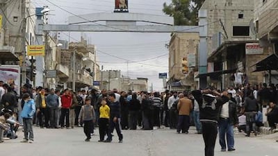 Protesters gather near the Omari Mosque in the southern old city of Deraa. At least six people were killed here Wednesday by Syrian forces.