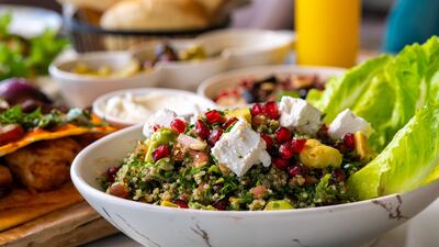 Vegetable salad with olive oil, molasses and walnuts, pomegranate, cheesy sumac crust from Beirut Sur Mer.