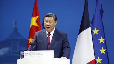 Mr Xi speaks at the sixth meeting of the business council. AP