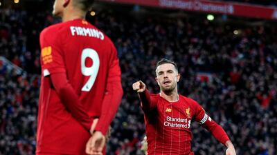 Liverpool's Jordan Henderson celebrates scoring his side's second goal against Southampton at Anfield. PA